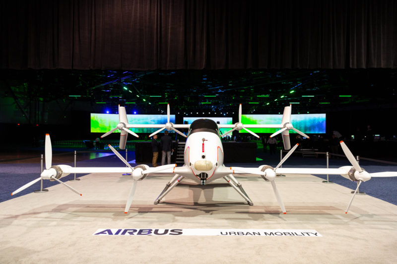 a white airplane on a stage