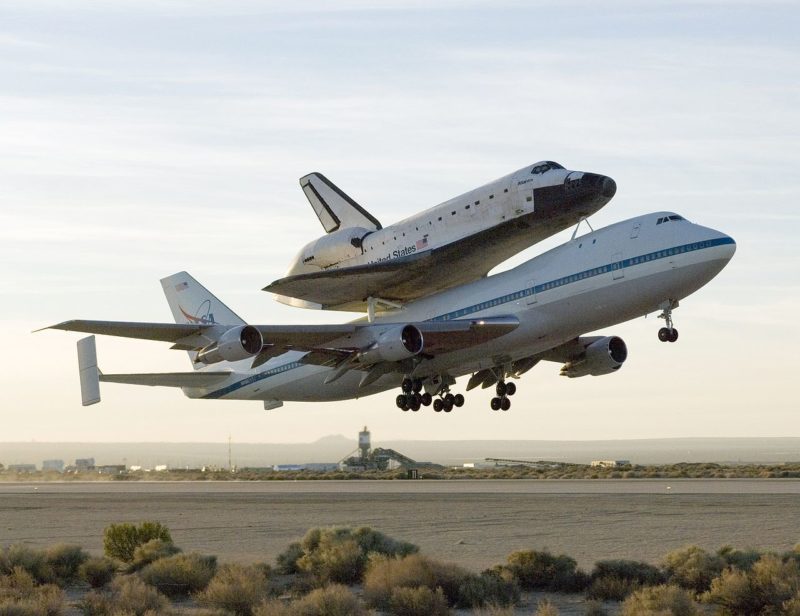 a plane carrying a space shuttle