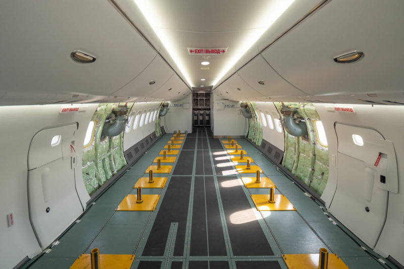 inside a plane with yellow and black floor