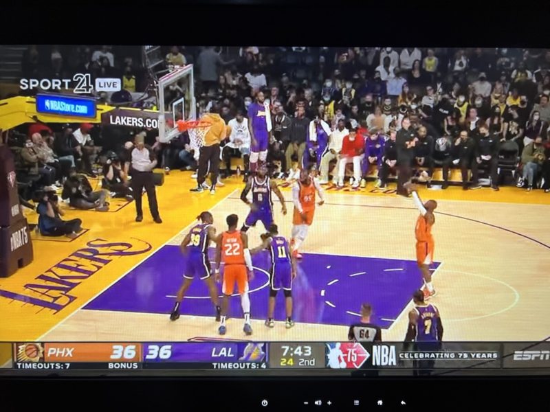 a basketball game on a television