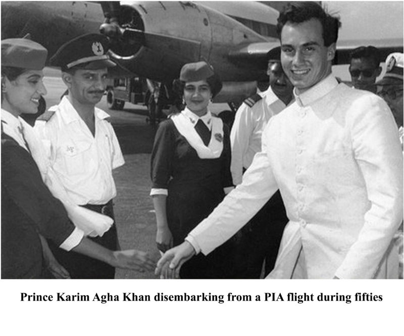 a man shaking hands with a group of people