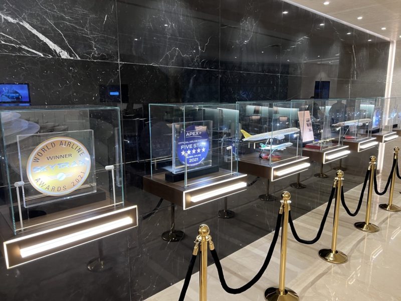 a display of awards in glass cases