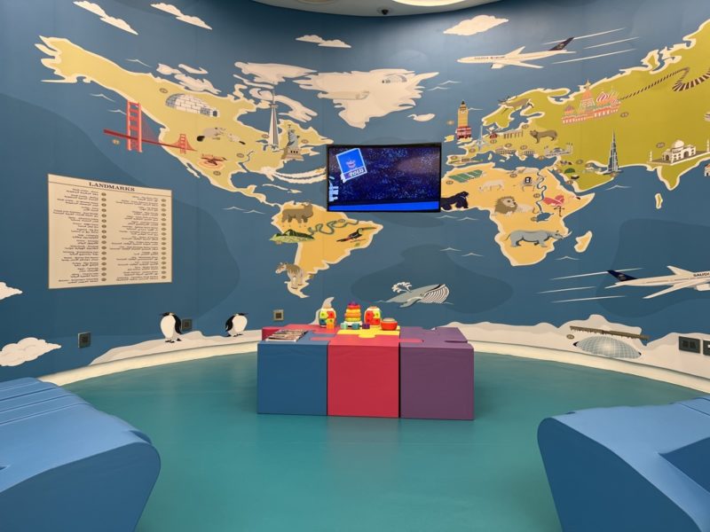Room with world map and TV