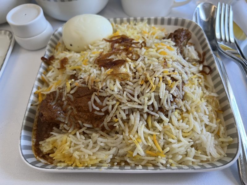 a plate of rice and meat