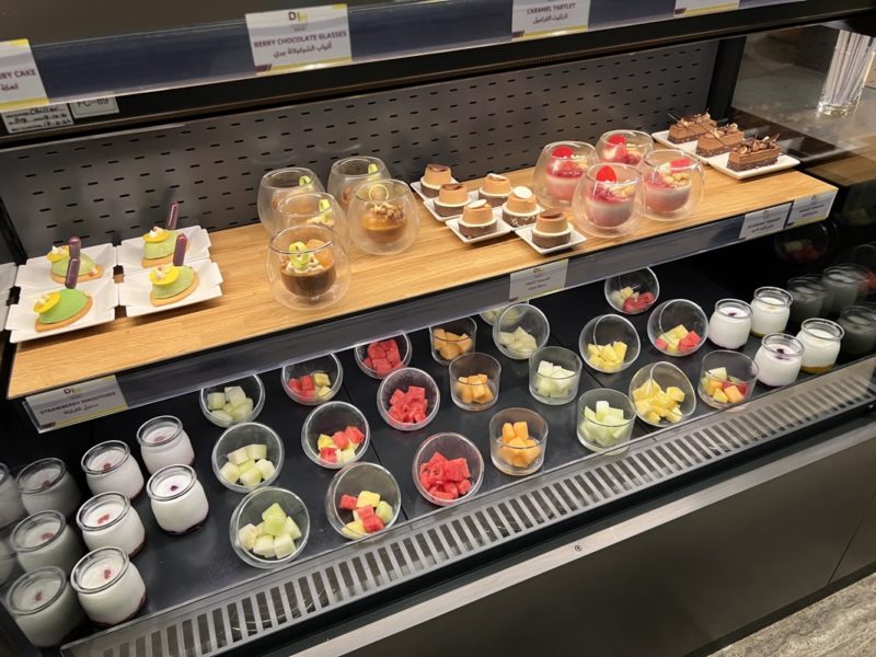 a display of desserts on a shelf