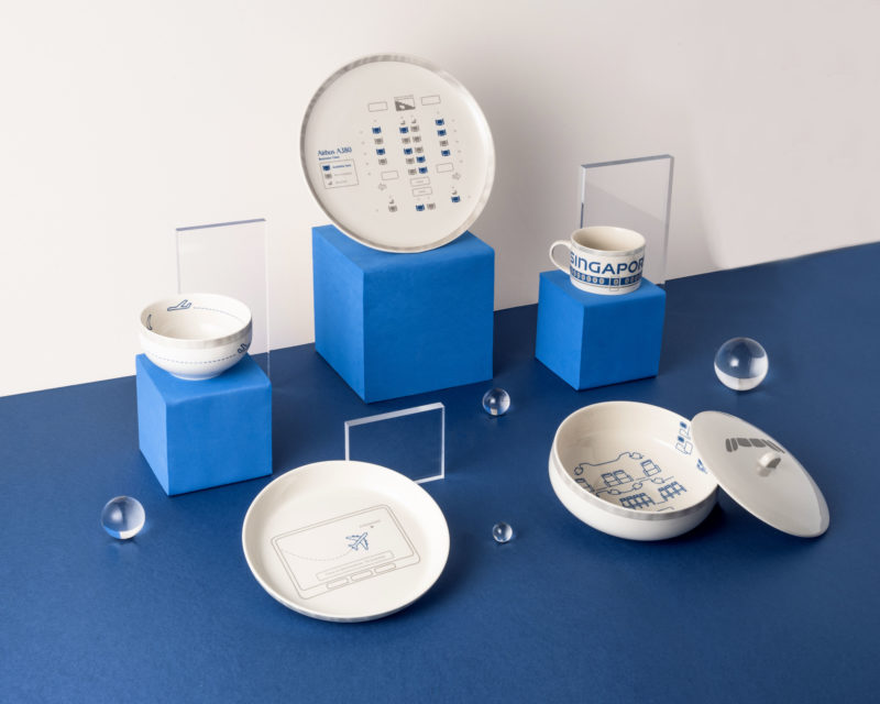 a group of white and blue dishes