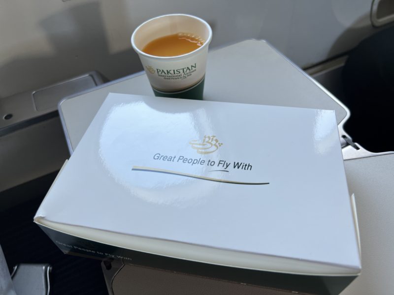 a book and a cup of tea on a table