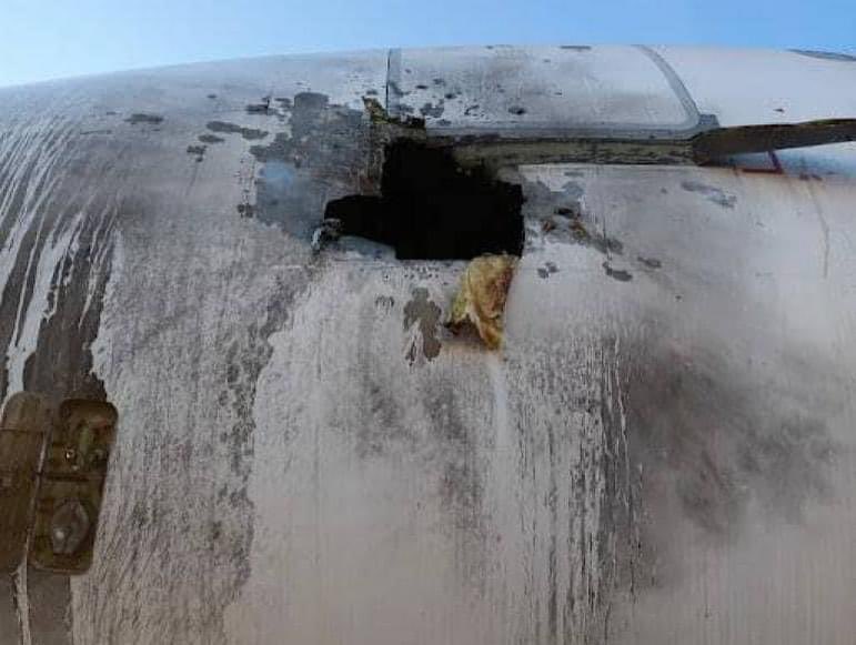a hole in the front of a plane