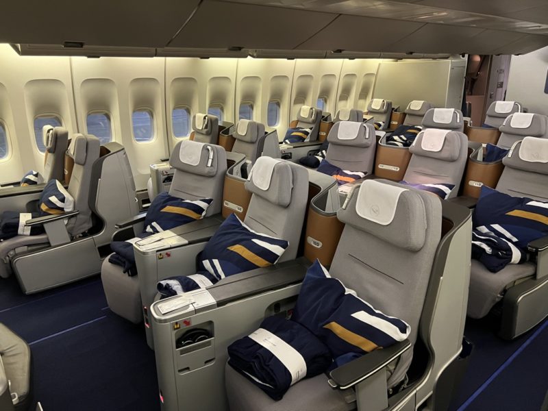 Lower deck of Lufthansa B747-400 has 2-3-2 seating configuration which is crowded and exposed.