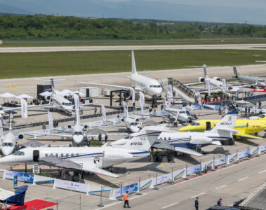 a group of airplanes on a runway