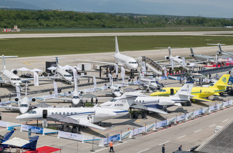 a group of airplanes on a runway