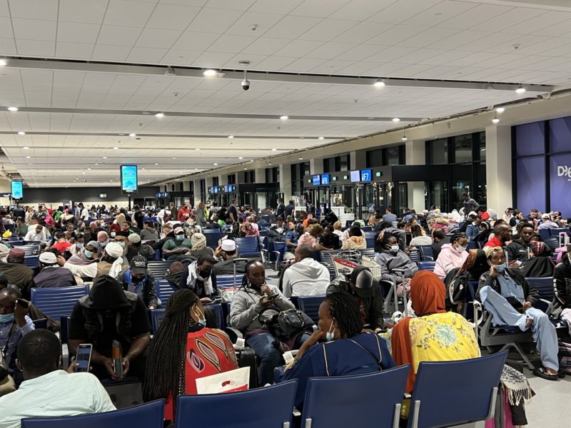 a large group of people sitting in chairs