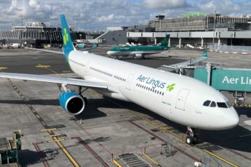 a large white airplane on a tarmac