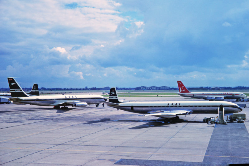 BOAC Comet 4, Boeing 707-436 and Britannia 300 at Heathrow. With Qantas 'V-Jet' Boeing 707-138B in background. Photo: Wikimedia Commons/Ken Fielding
