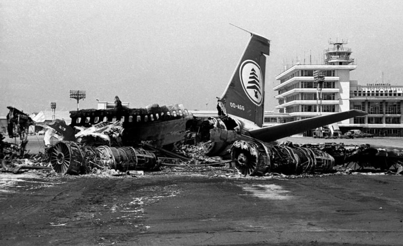 a crashed airplane on the runway