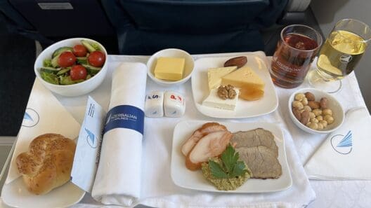 food on a tray on a plane