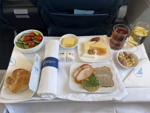 food on a tray on a plane