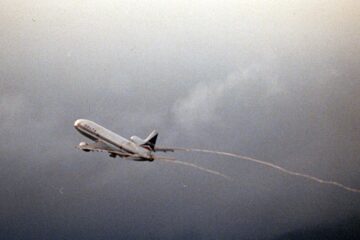 an airplane flying in the sky