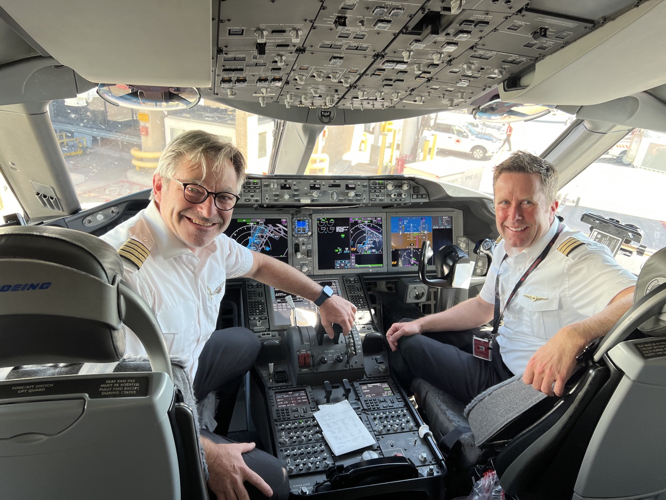 two men in a cockpit