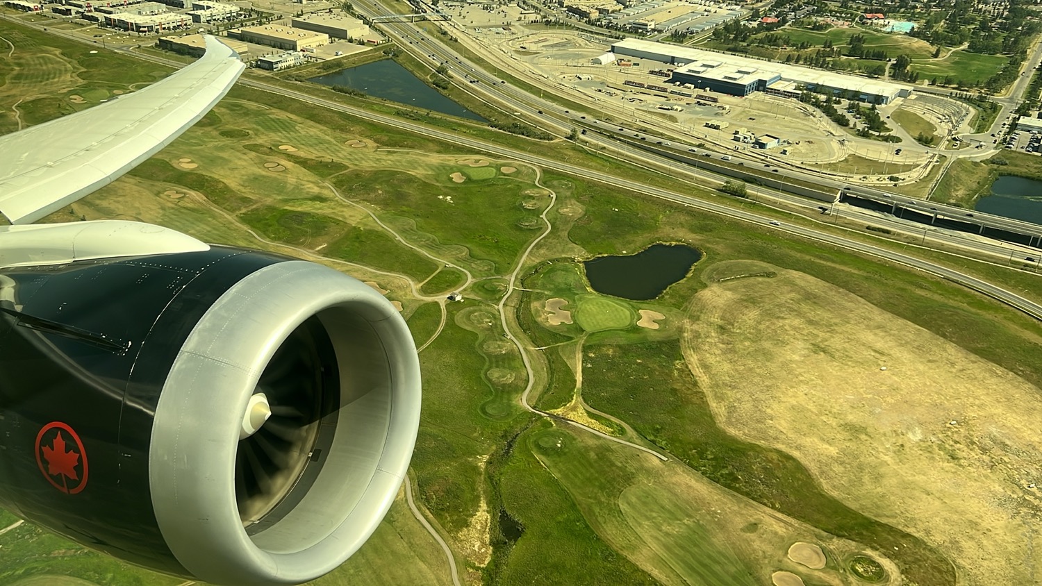 an airplane engine and a golf course