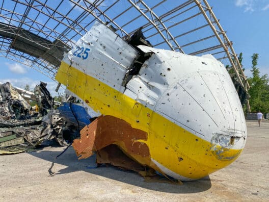 a large white and yellow object with holes in it