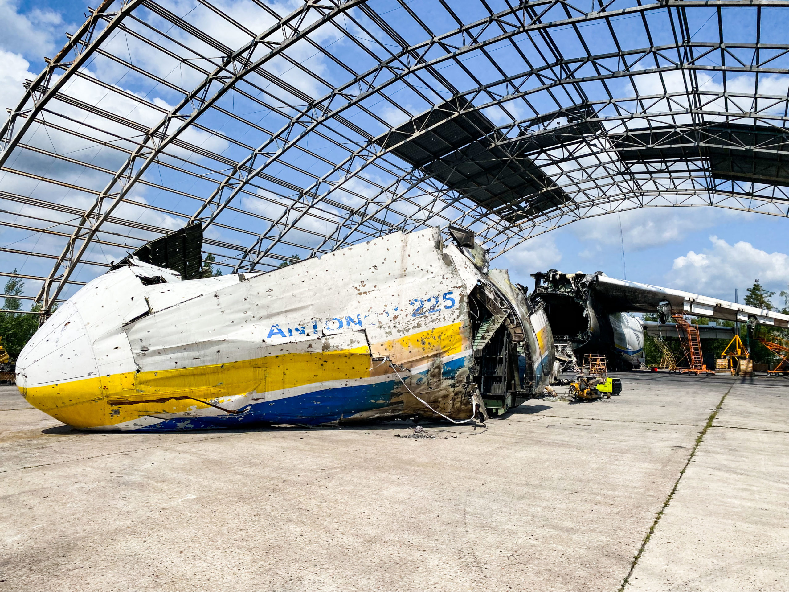 a crashed airplane in a hangar