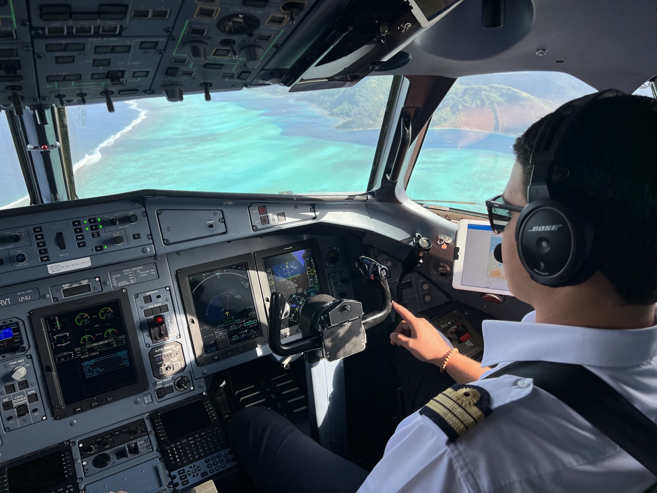 a person in a pilot's cockpit