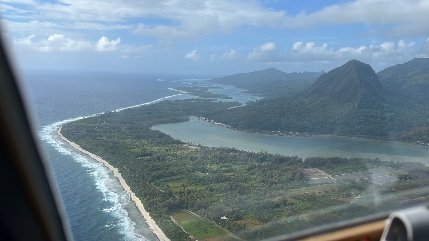 a aerial view of a beach and land