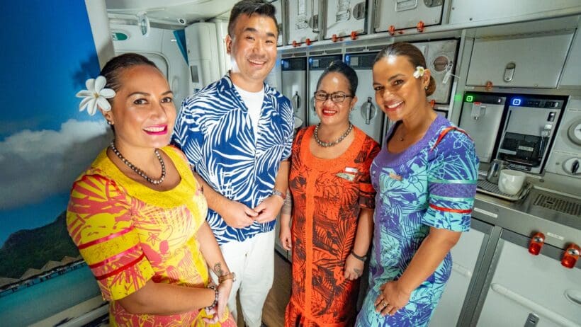 a group of people standing in a room