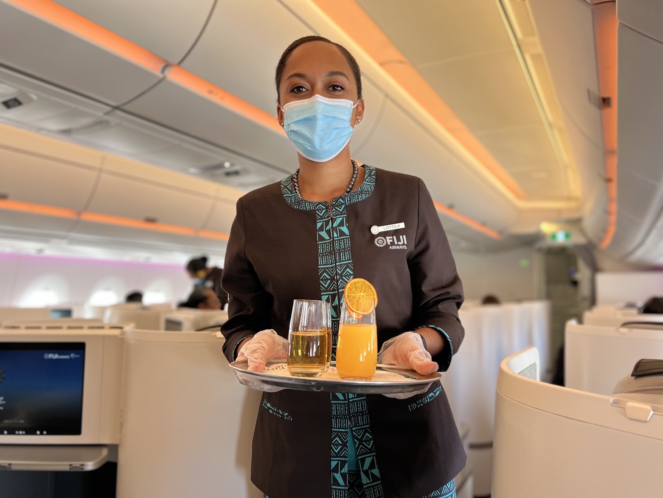 Welcome drink on Fiji Airways comes with a selection of orange juice or champagne.