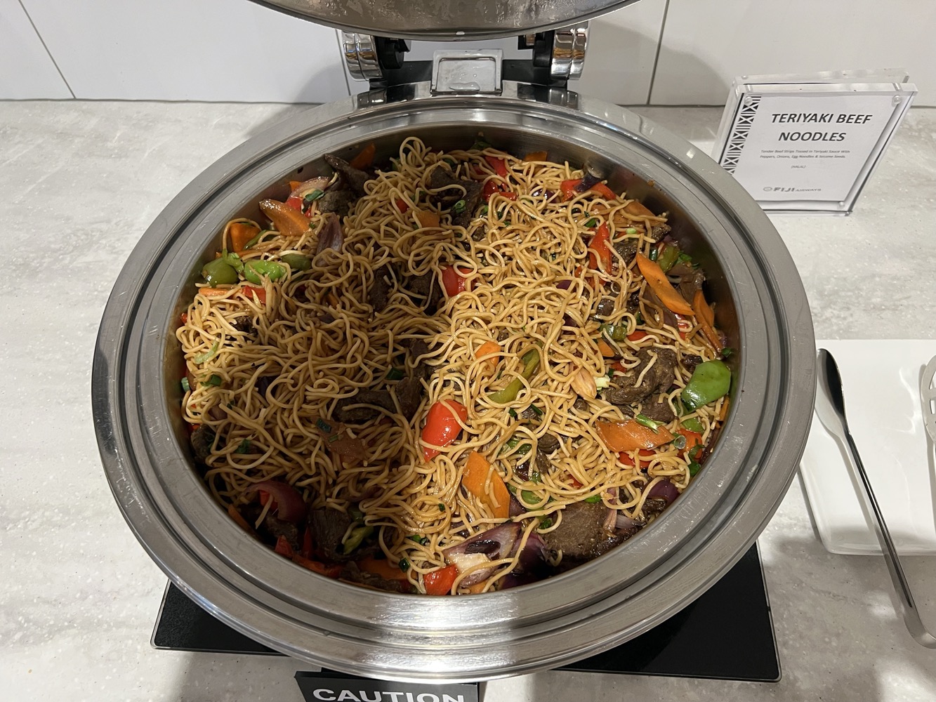 a bowl of noodles and vegetables