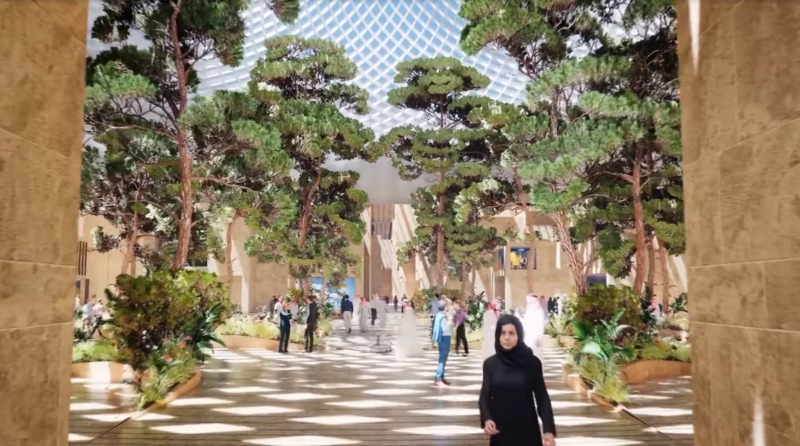 a woman walking in a courtyard with trees and people