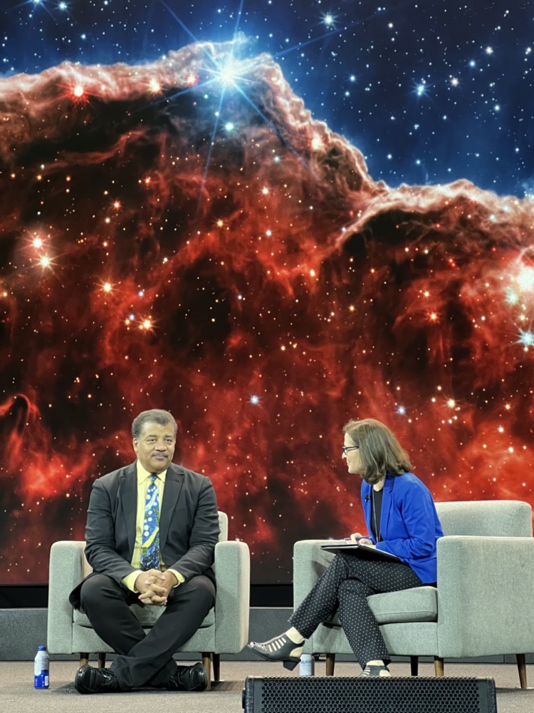 Astrophysicist and author Neil deGrasse Tyson awed the crowd with dramatic images from space, underscoring the importance of scientific exploration.