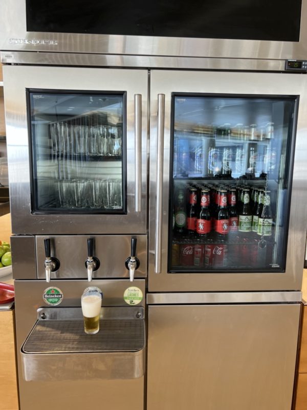 a beverage cooler with beer dispenser