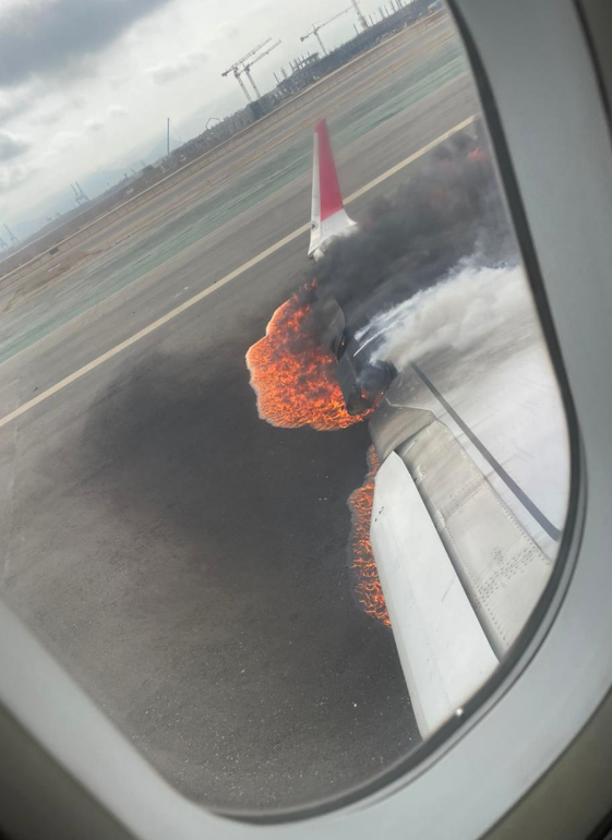 a plane on fire from a plane