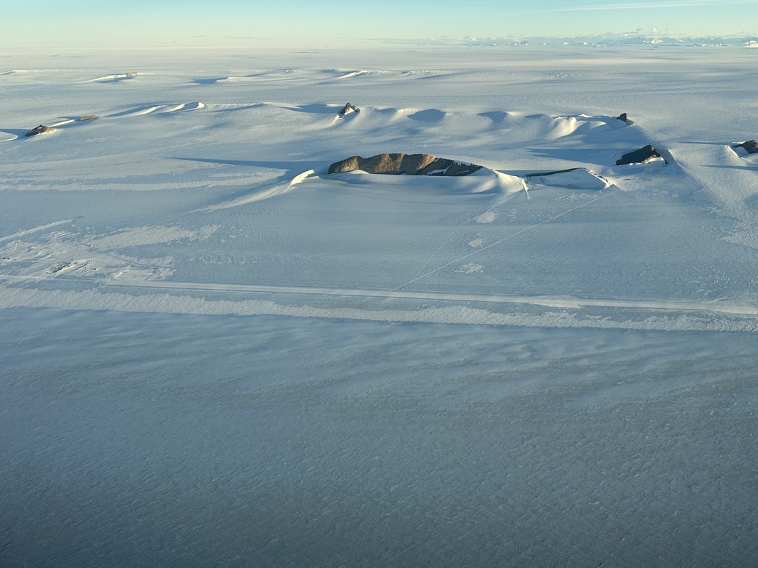 Leaving Antarctica, Wolf's Fang Runway from the downwind departure.