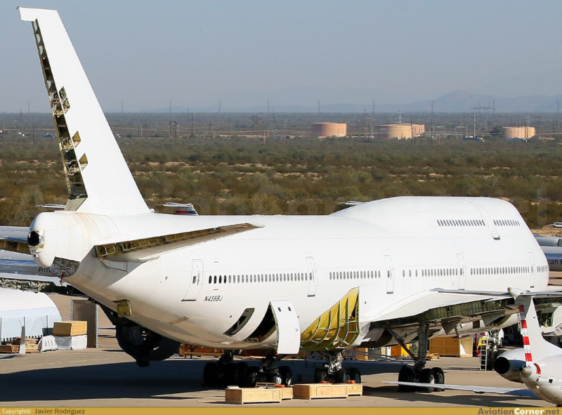a large white airplane on a tarmac