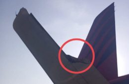 a plane wing with a red circle