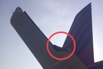 a plane wing with a red circle