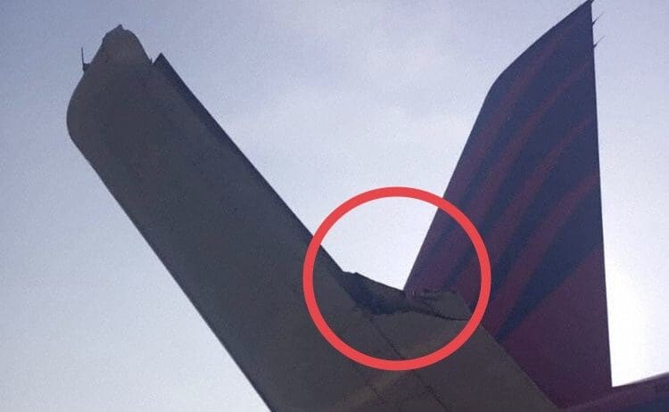 a plane wing with a red circle
