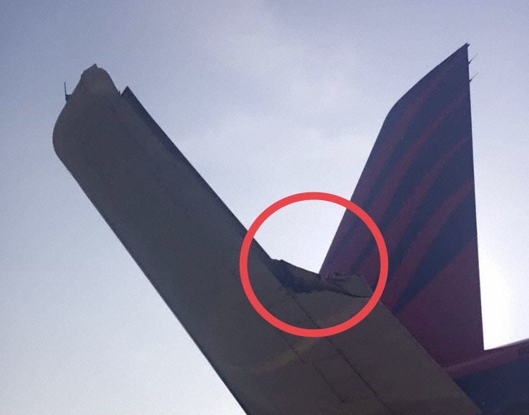 a plane wing with a red circle