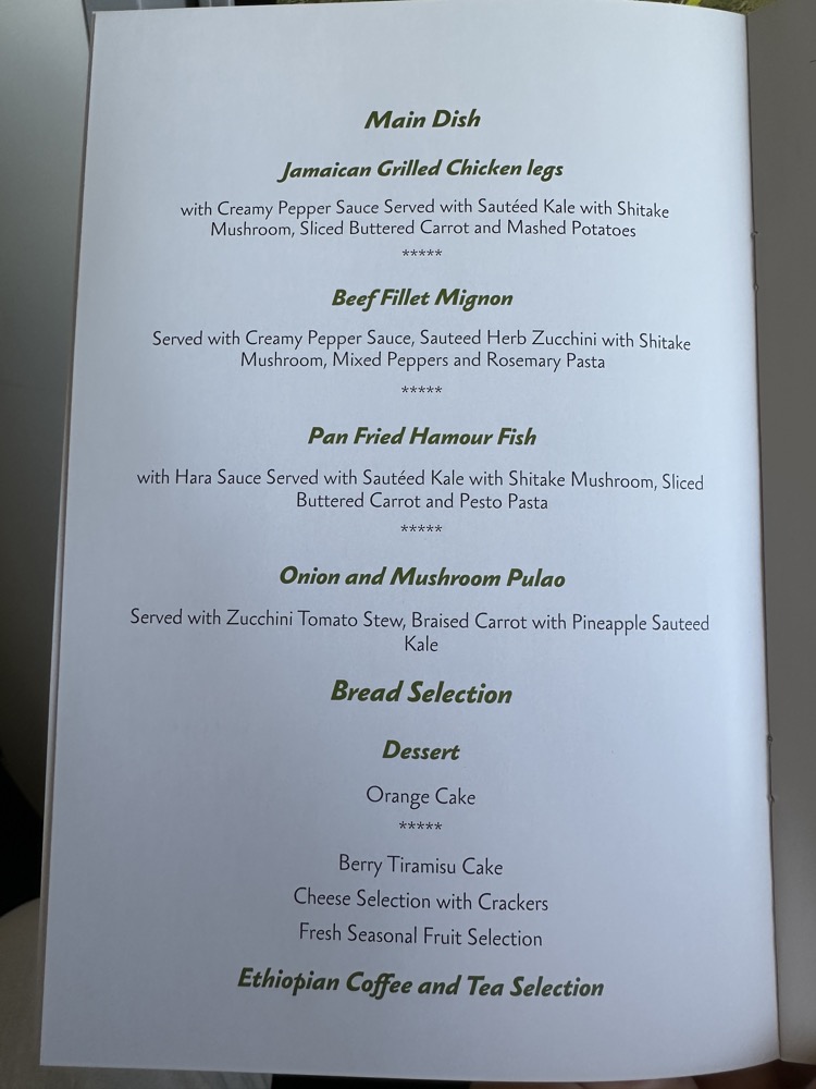 a menu with green text