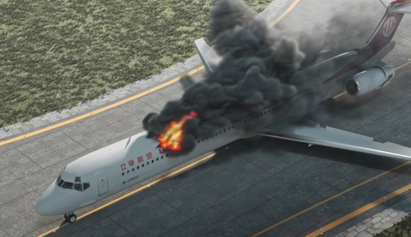 an airplane on fire on a runway