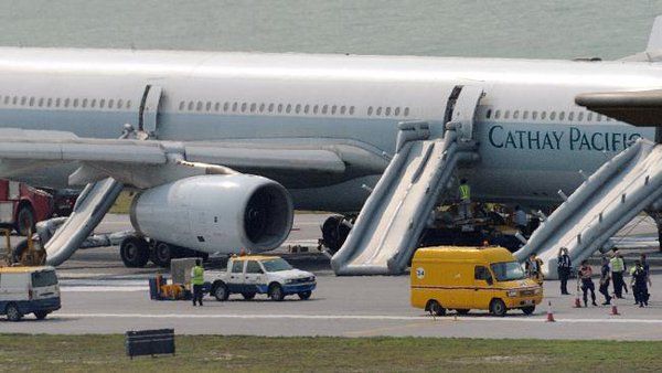 a plane with a ramp going up to the ground