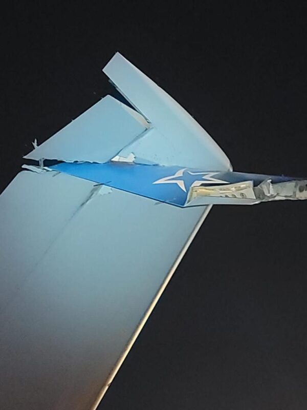 a broken wing of an airplane