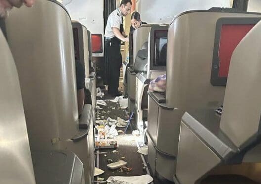 a man and woman in an airplane