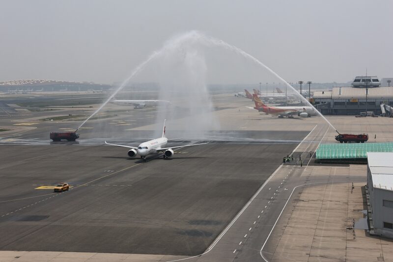 jet spraying water on runway
