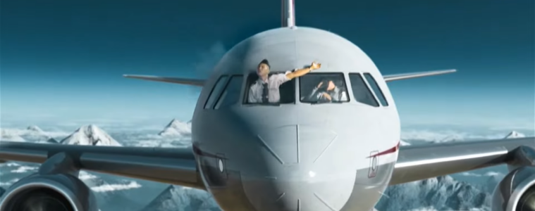 a man in the window of a plane