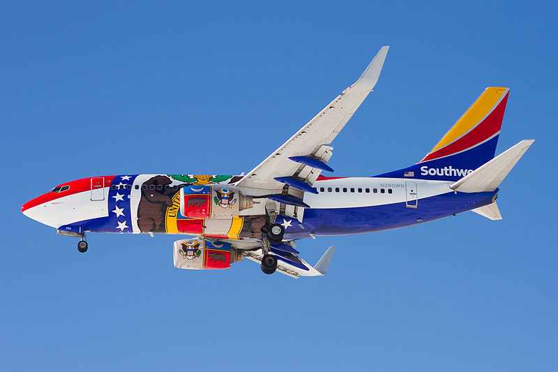 a plane with colorful designs on it