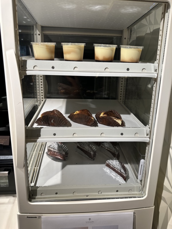 a shelf of food in a refrigerator